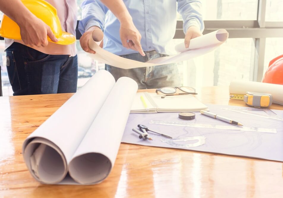 Young,Engineers,Working,In,The,Office
